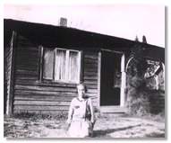 First county library in Willowbrook with the first librarian (Mrs. Jenks) kneeling in front, c. 1913