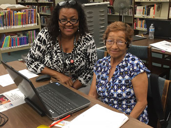 library staff with student