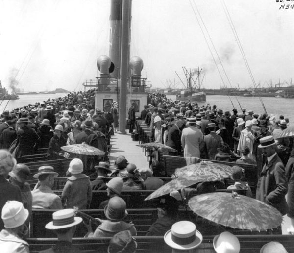 Top deck of the S.S. Catalina filled with passengers as the steamer leaves a Southern California harbor, c. 1920s